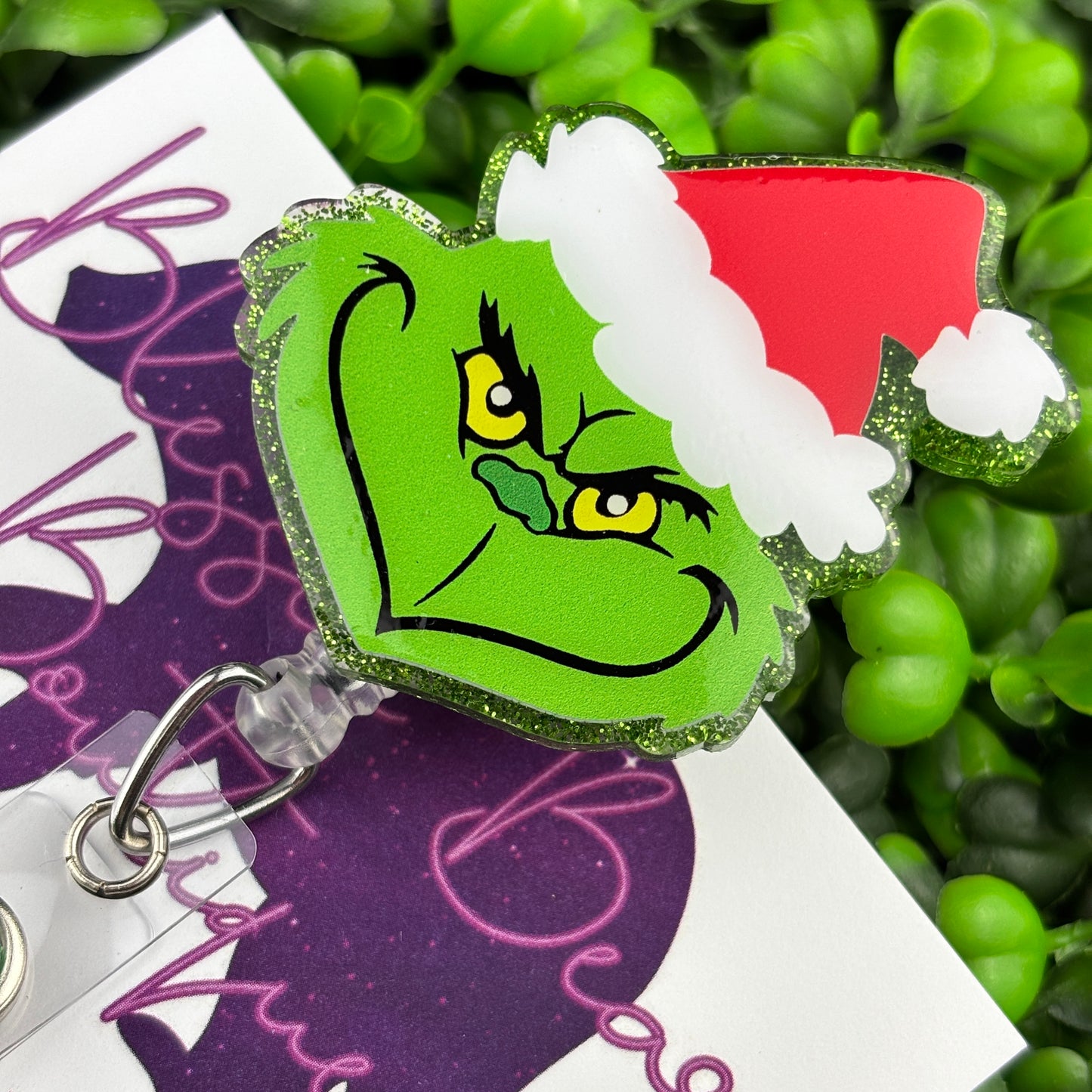 Green Christmas Villain Badge Reel