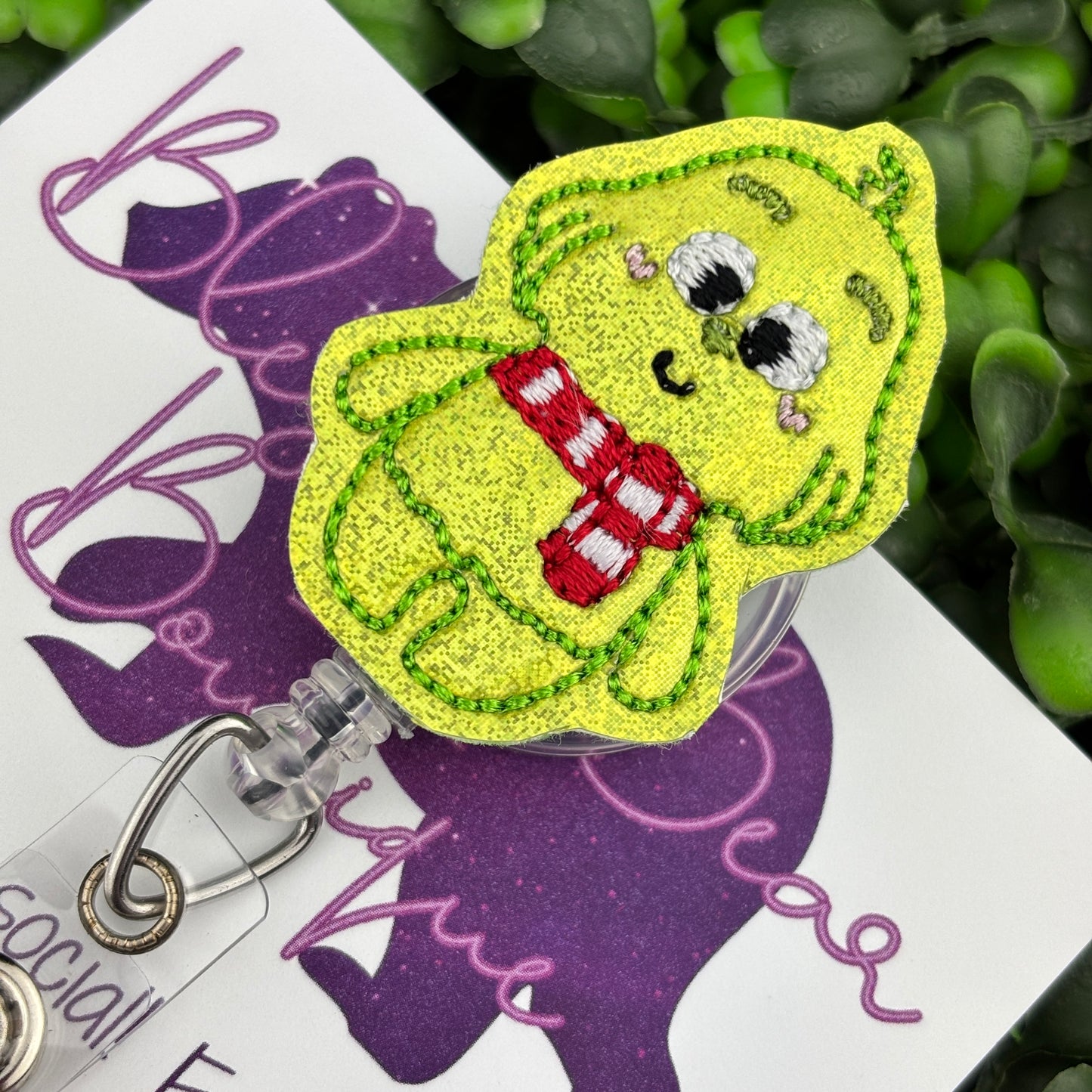 Baby Christmas Villain Felt Badge Reel