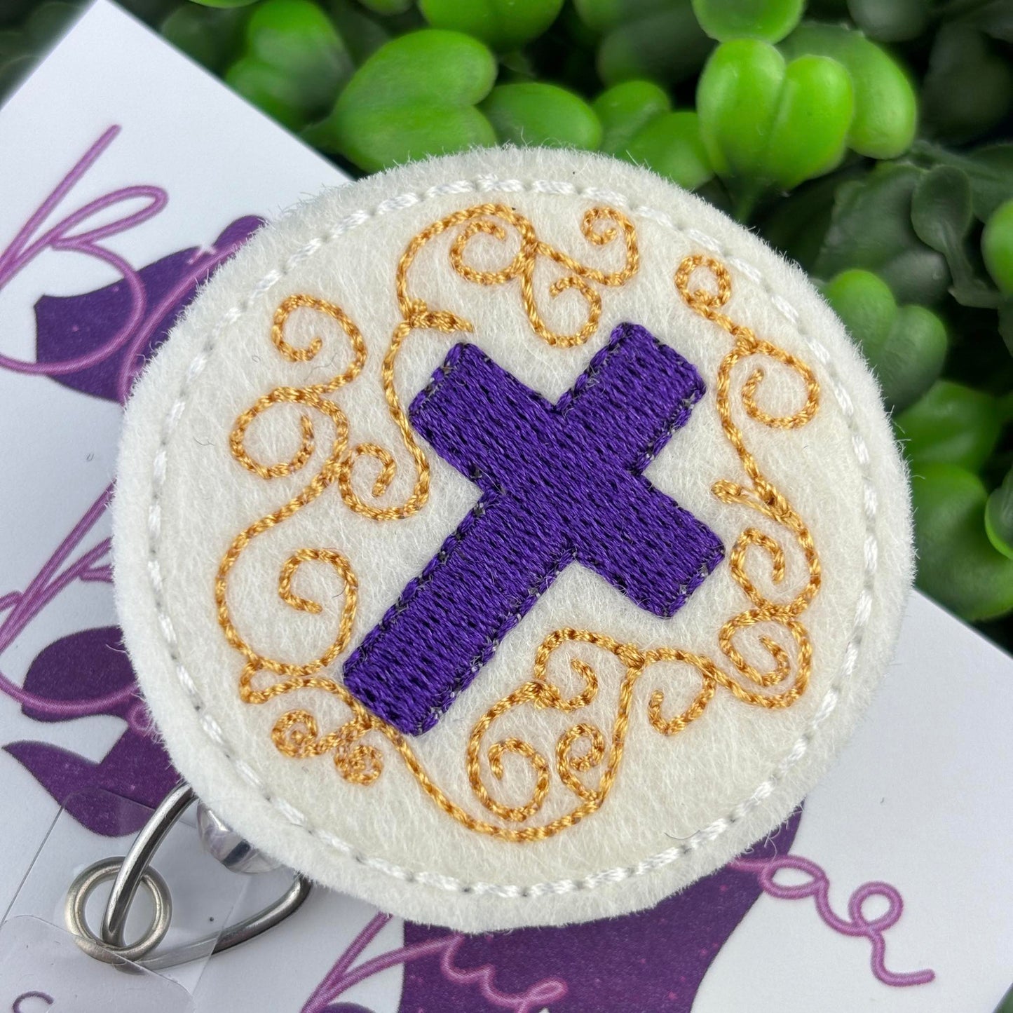 Cross Badge Reel