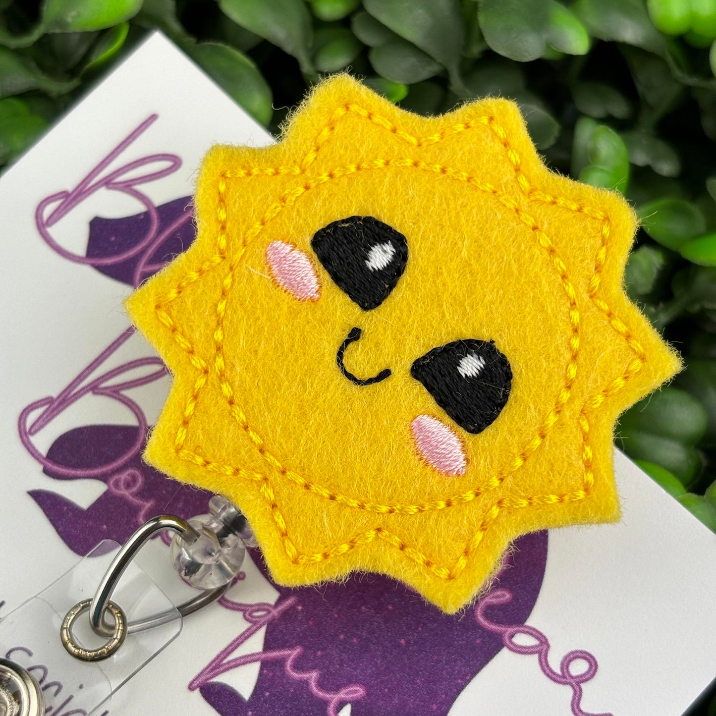 Smiling Sun Felt Badge Reel